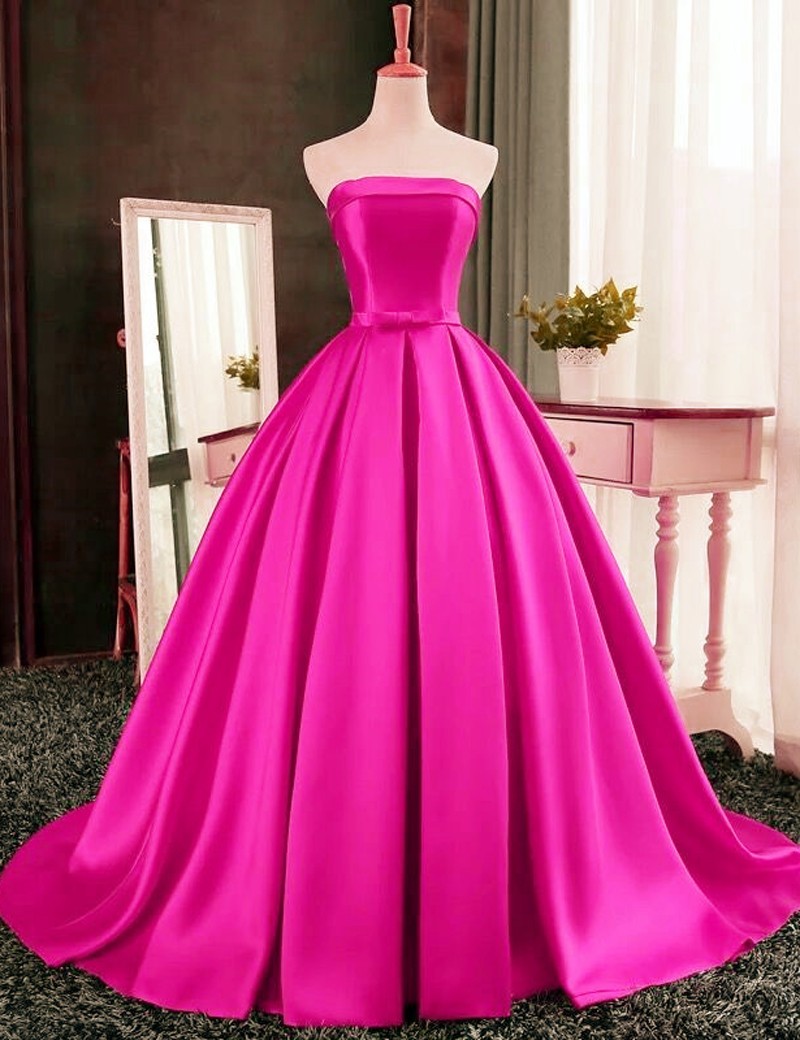 Pink Satin Floor Length Prom Gown Featuring Strapless Straight Across Bodice With Bow Accent 